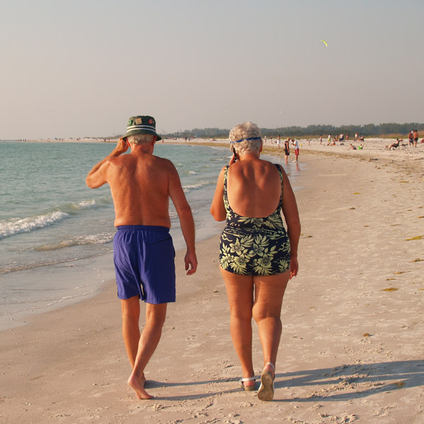 elderly couple on beach